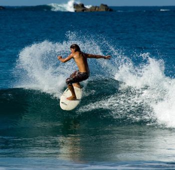 Surfer Riding the Waves in Costa Rica